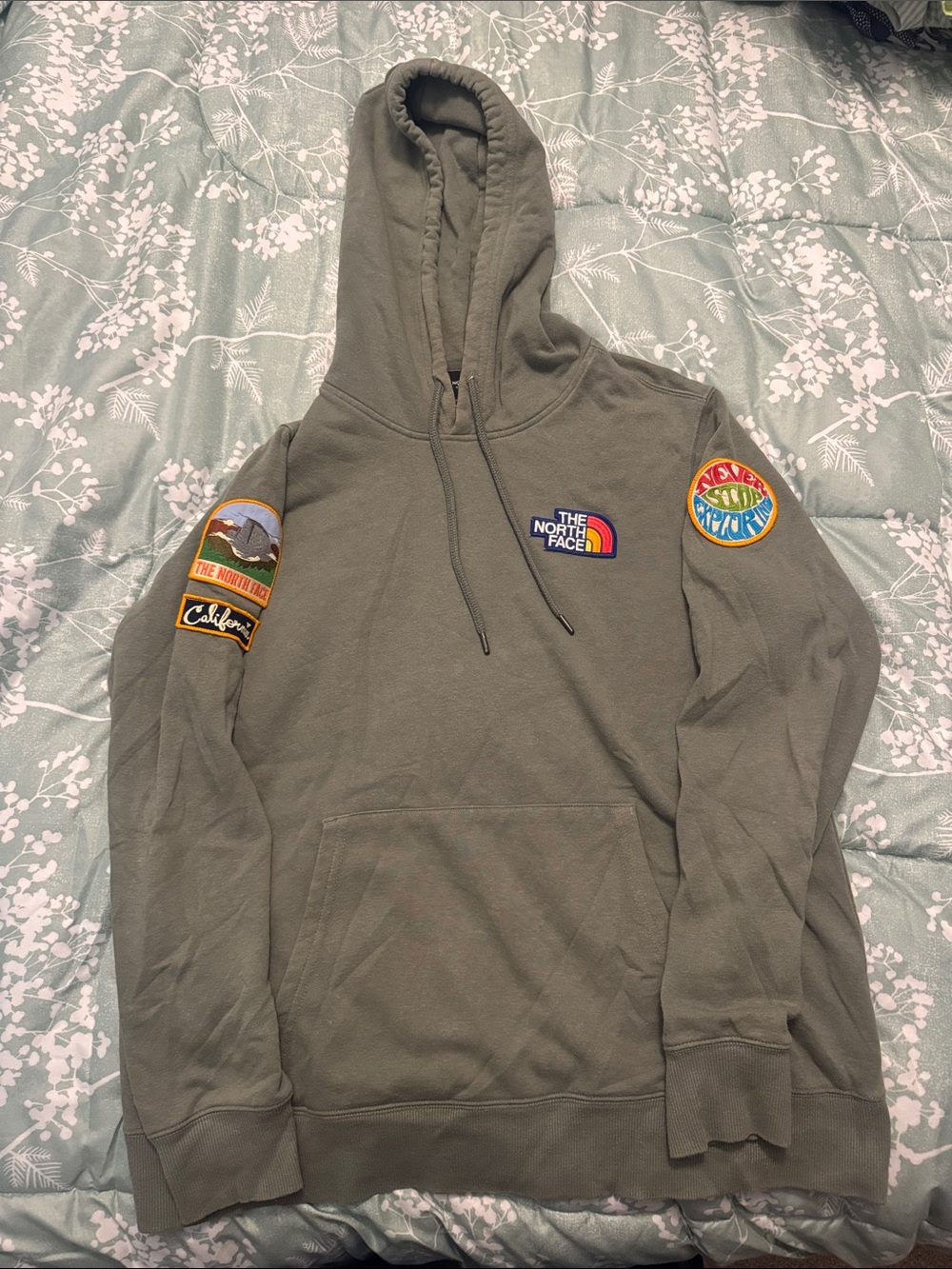 The North Face Olive Green Pullover Hoodie with Color Patch Accents